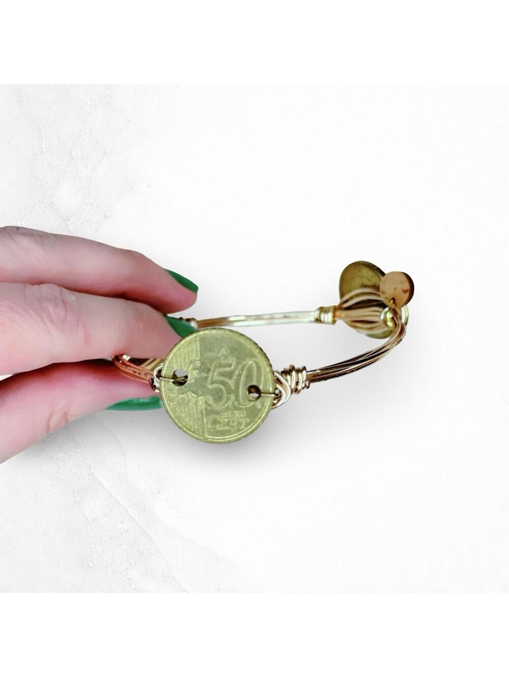 600. Faux Coin Wire Bangle Bracelet